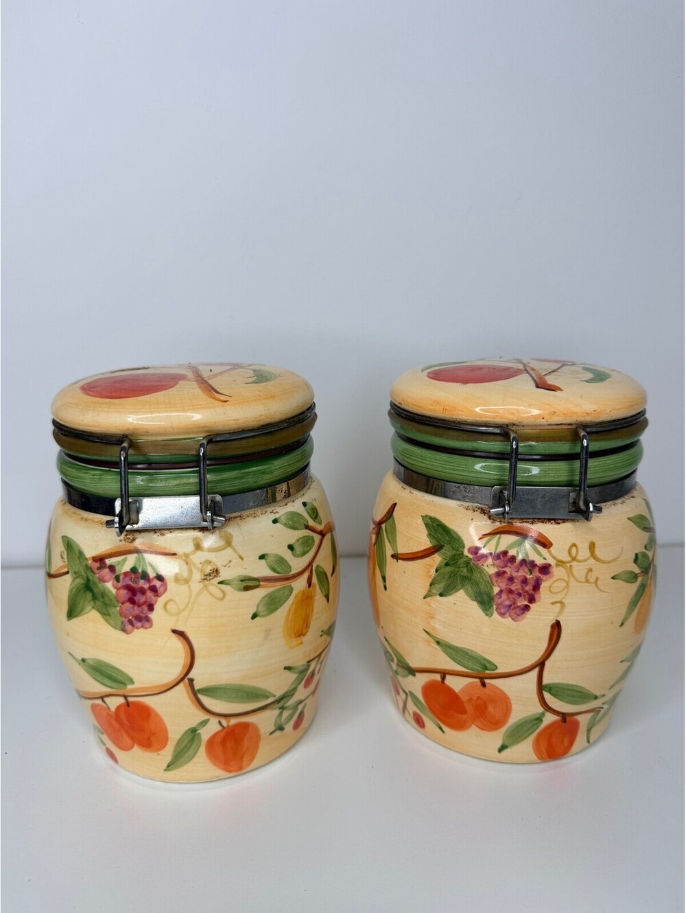 Hand painted ceramic canister set with fruit design